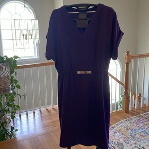Purple polyester knit dress with a V-neck and cuffed short sleeves, size 14/16.